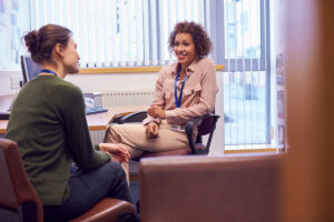 Person talking to their therapist during an individual therapy program